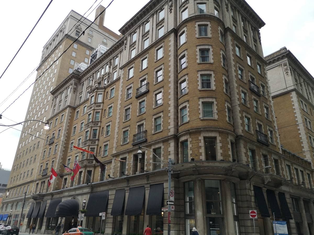 A grand Edwardian hotel facade on a city street