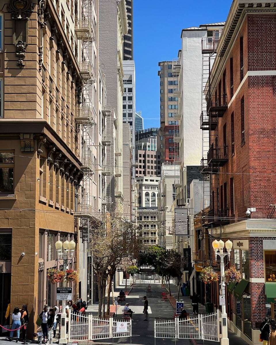 A narrow pedestrian lane between tall buildings