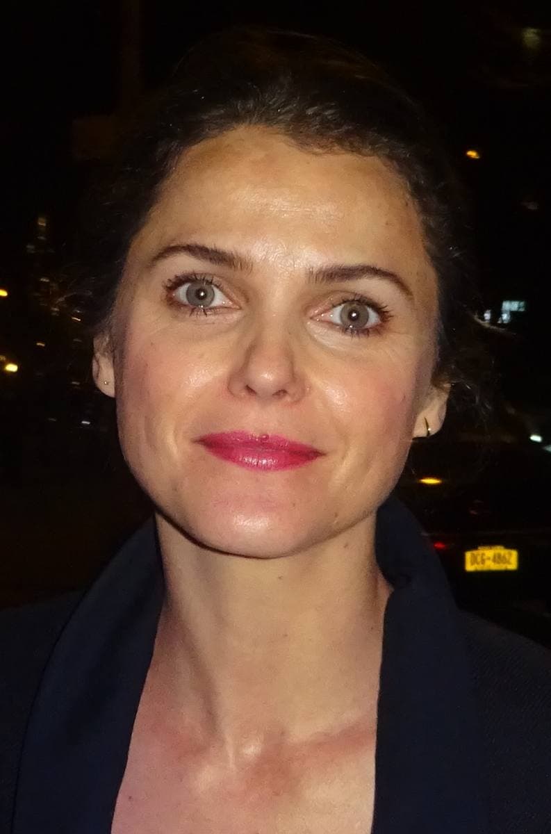 Keri Russell, long brown hair, looking into the camera at night