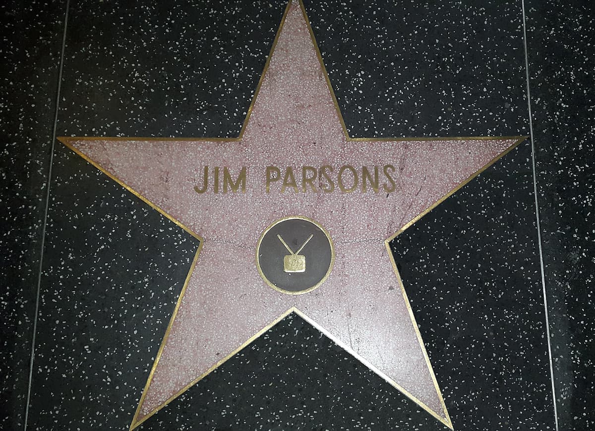A pink terrazzo star with a brass television emblem, engraved Jim Parsons