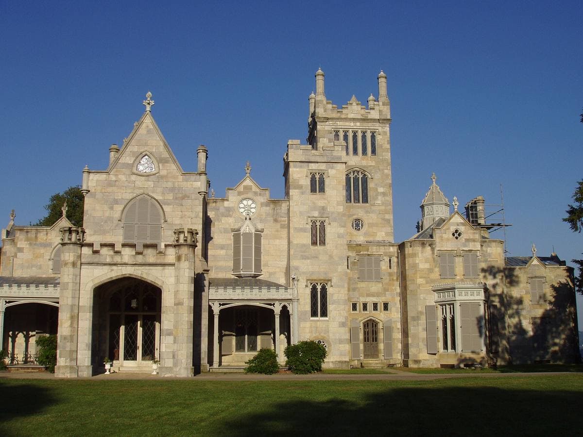 Lyndhurst, a grey Gothic Revival stone house with a tower and pointed windows