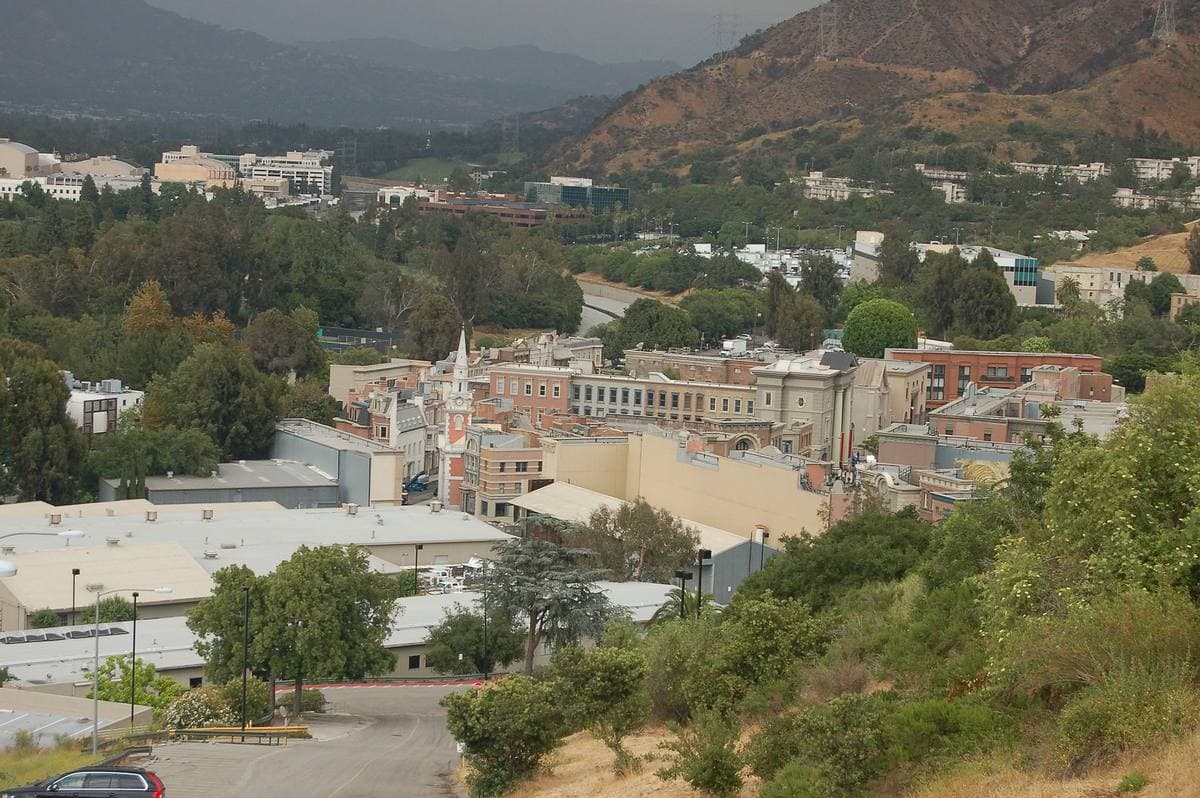 Rooftops and facades of studio backlot sets seen from above