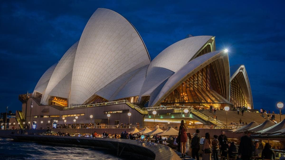 The white sail roofs of the Sydney Opera House on the harbour