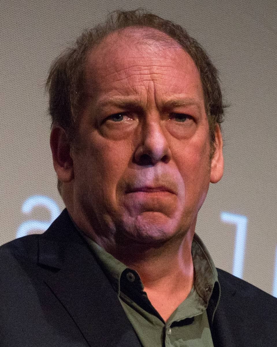 Bill Camp, bearded, speaking at a festival discussion