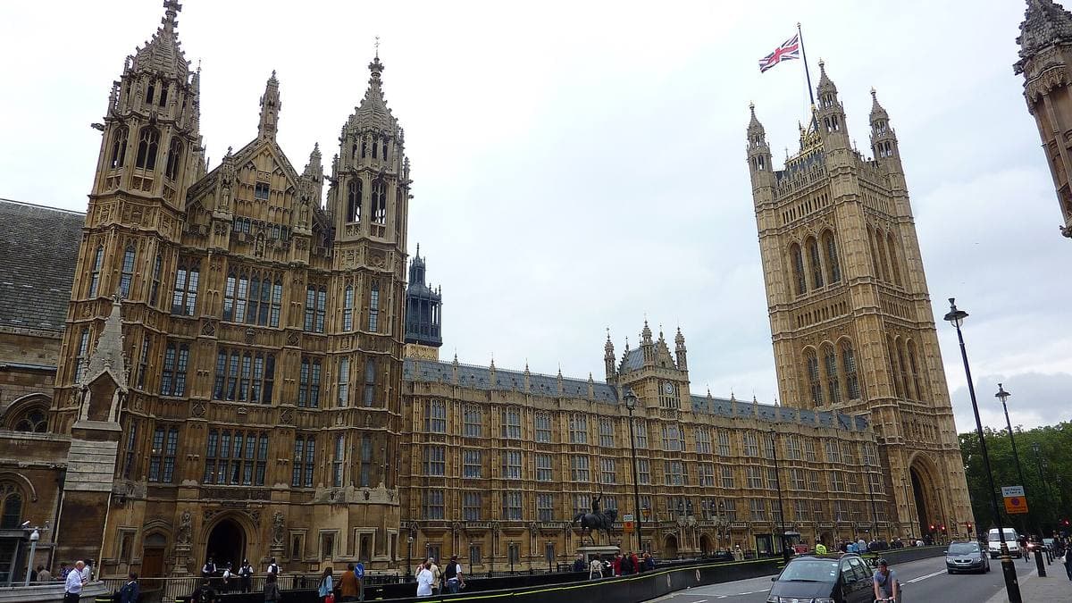 The long Gothic front of the Palace of Westminster with the Victoria Tower on the right