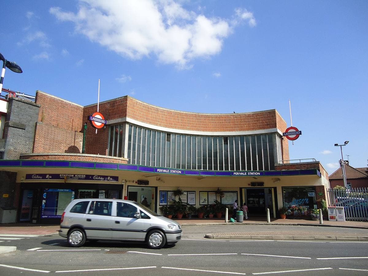 The curved brick and glass front of Perivale Underground station