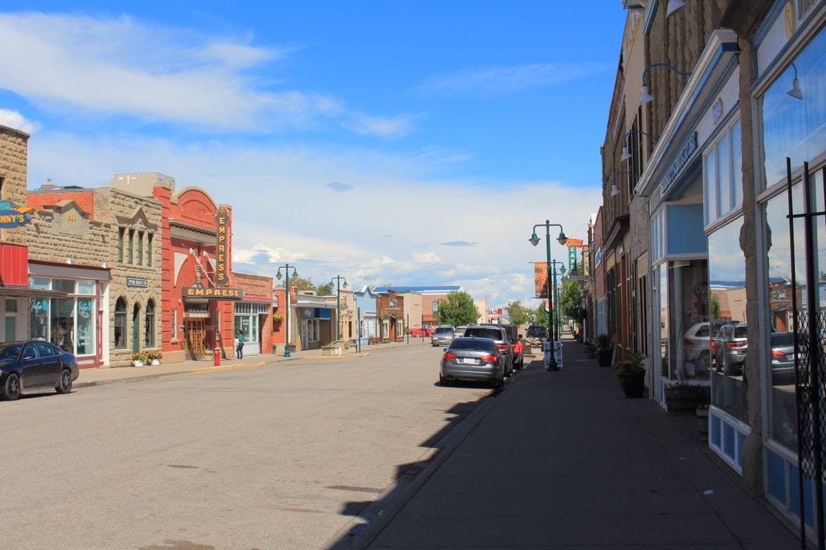 A small-town main street of brick and sandstone fronts