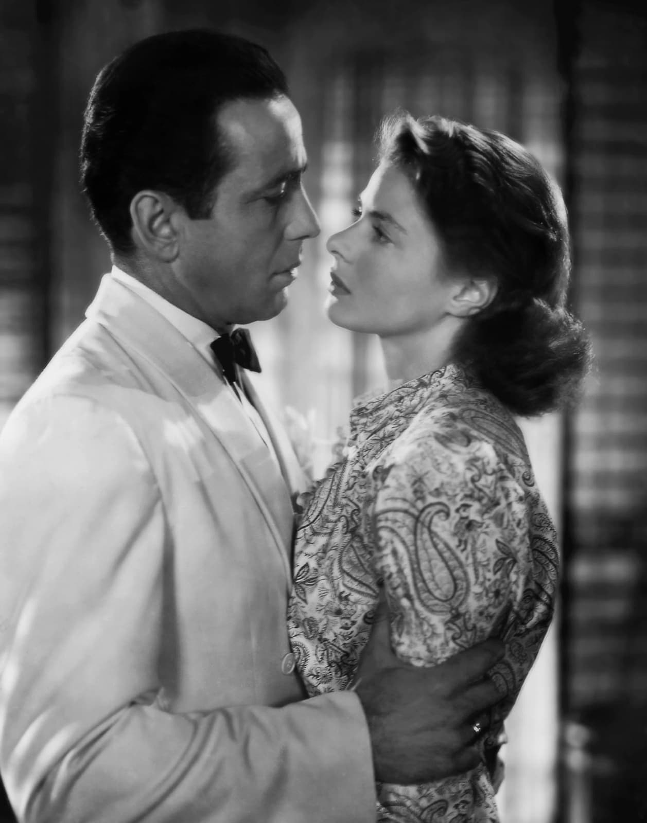 Humphrey Bogart and Ingrid Bergman look at each other in Casablanca