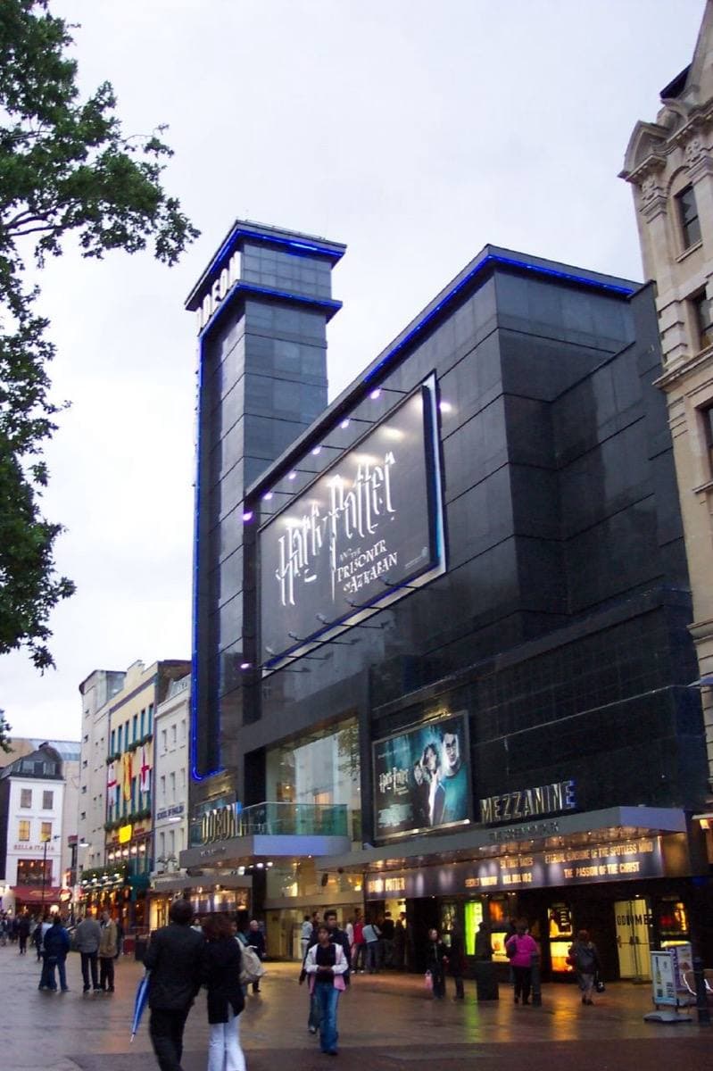 The dark tower of the Odeon cinema on Leicester Square at dusk