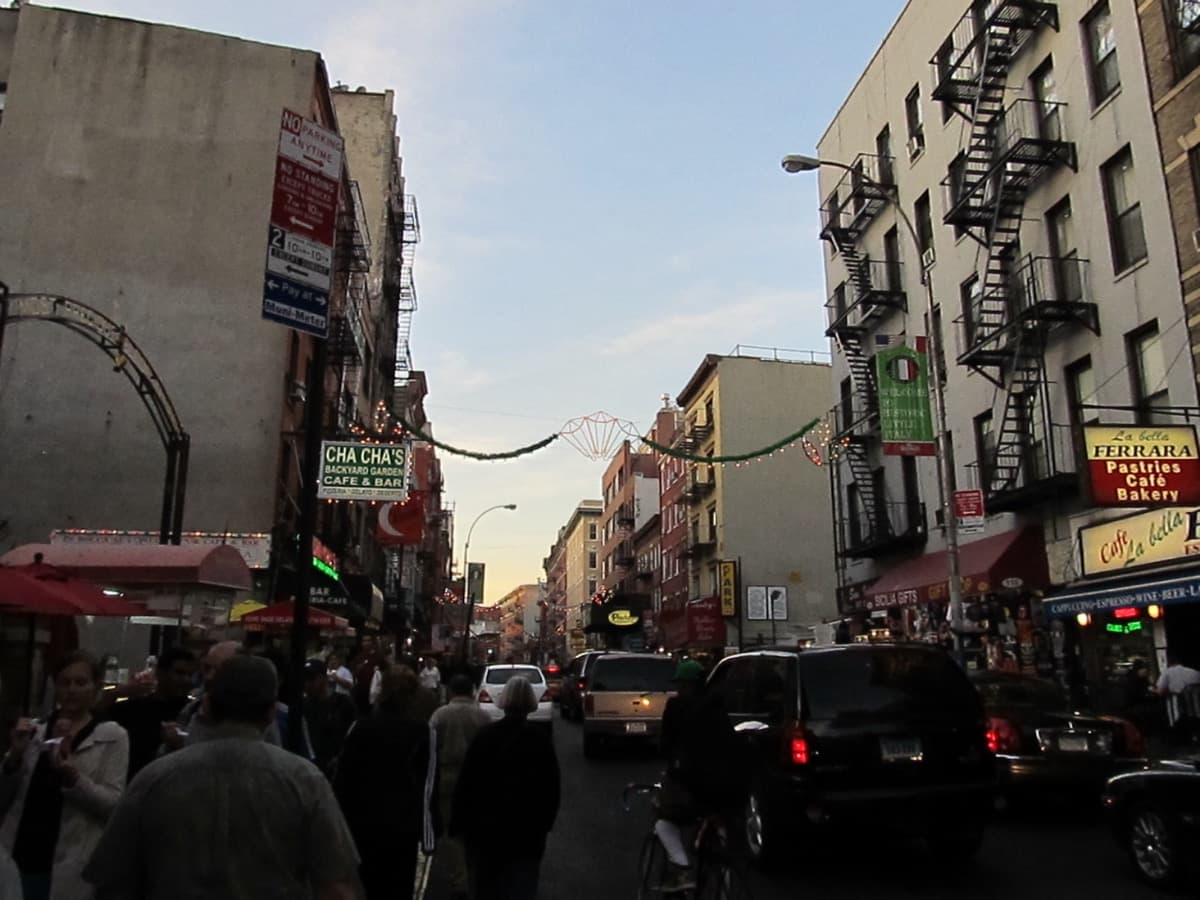 Cafe awnings and flags along Mulberry Street in Little Italy