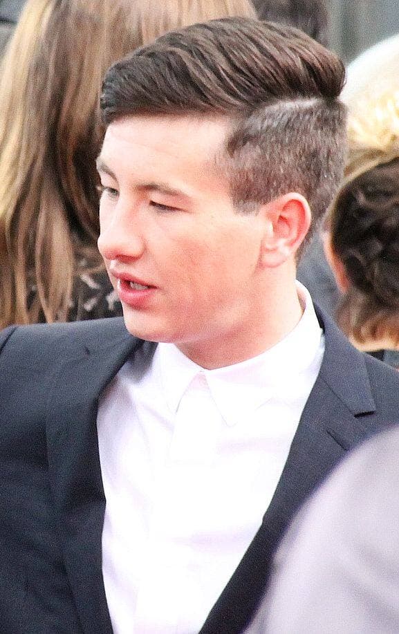 Barry Keoghan in a dark suit at an evening premiere