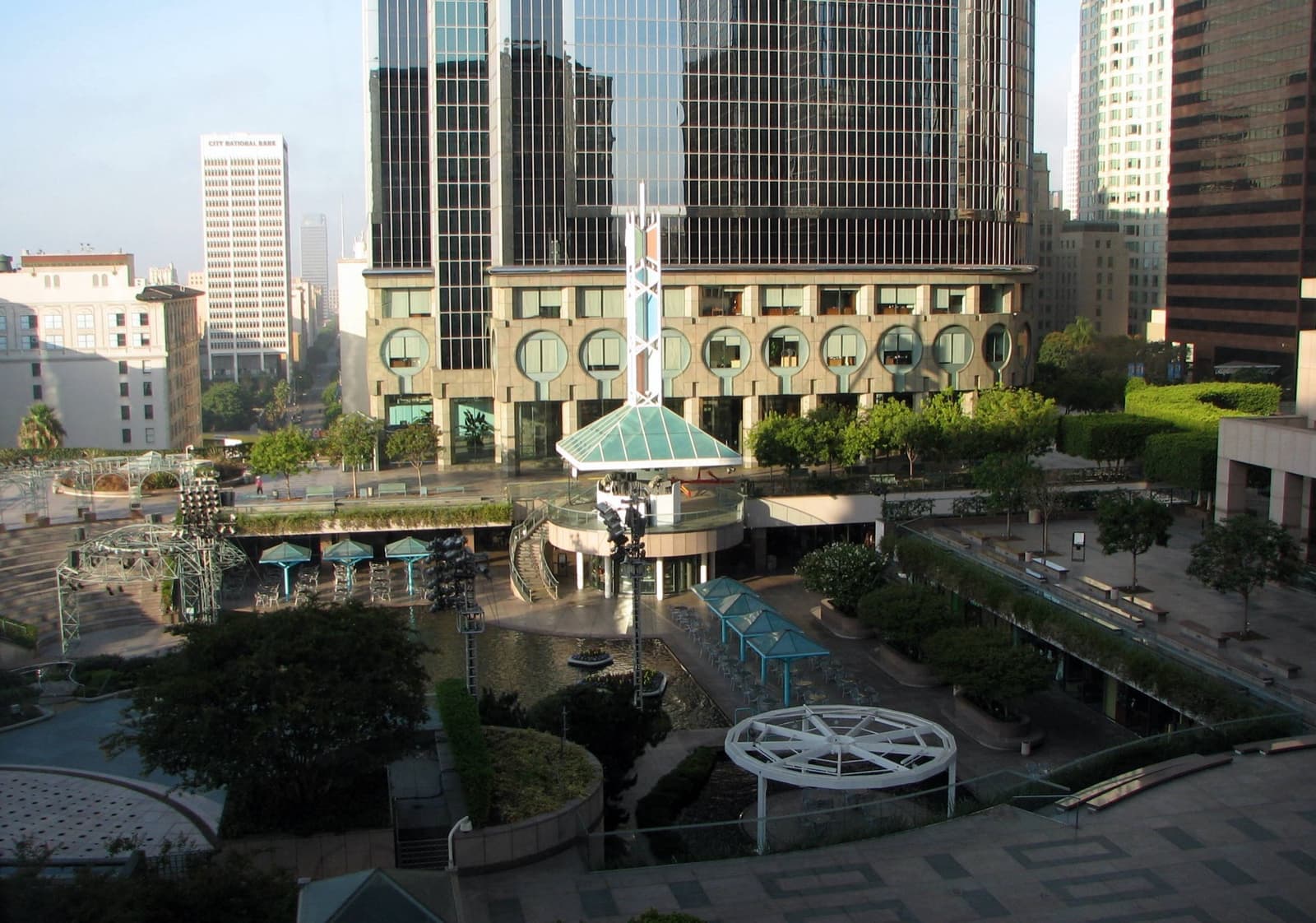 Terraced pools and planting in a plaza ringed by downtown towers