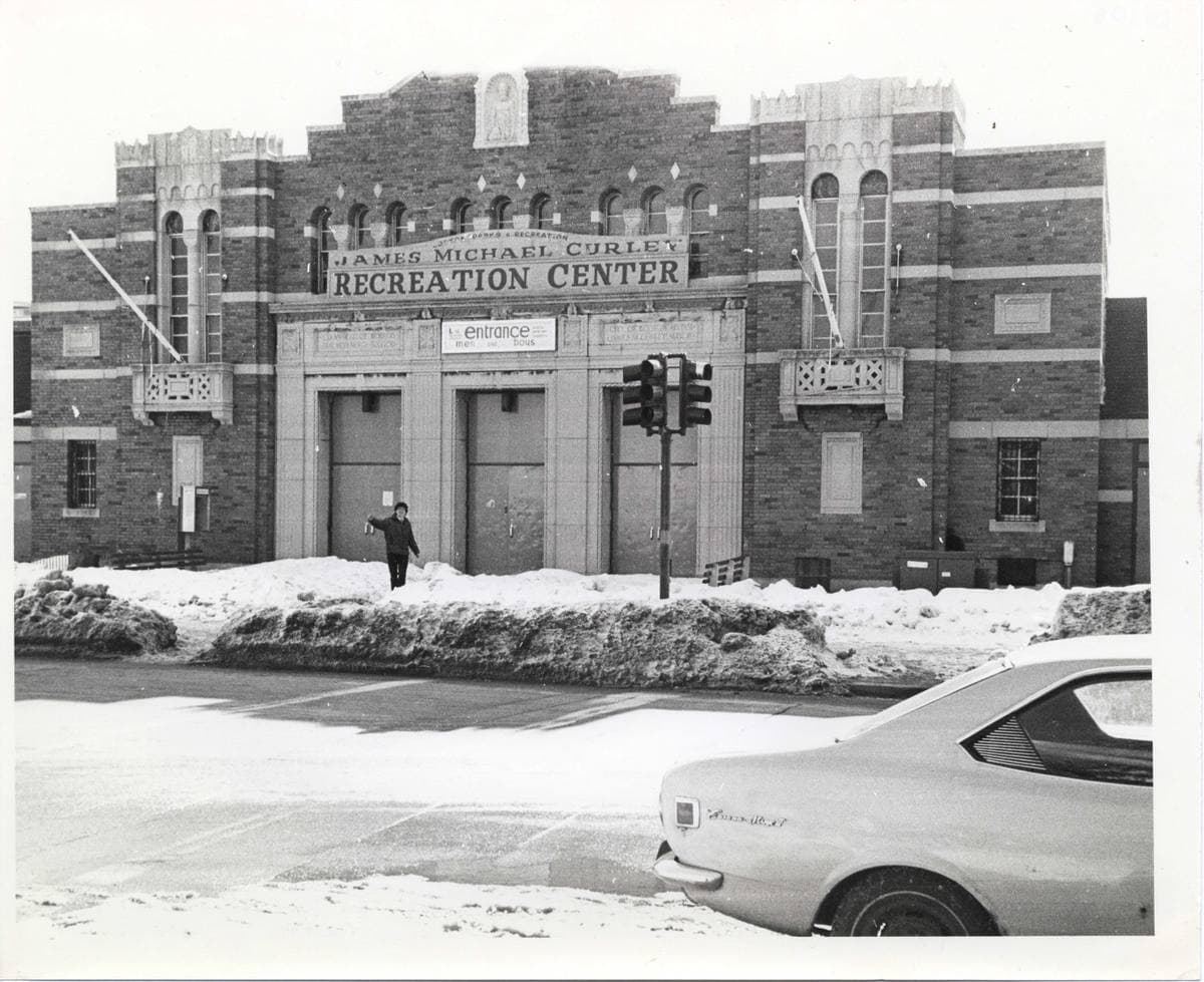 Black-and-white photograph of the brick L Street Bathhouse in snow