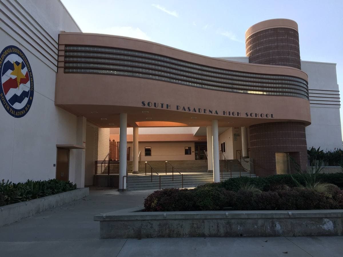 A curved pink-and-brown school entrance with the words South Pasadena High School