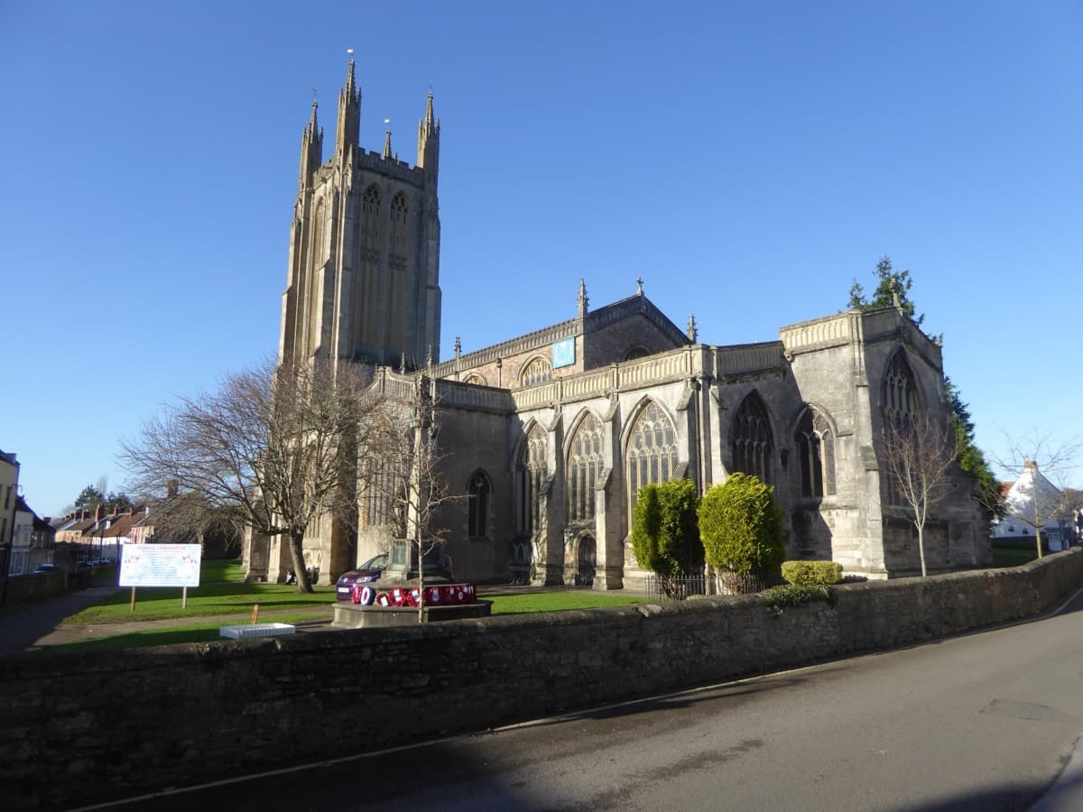 A large stone parish church with a tall tower