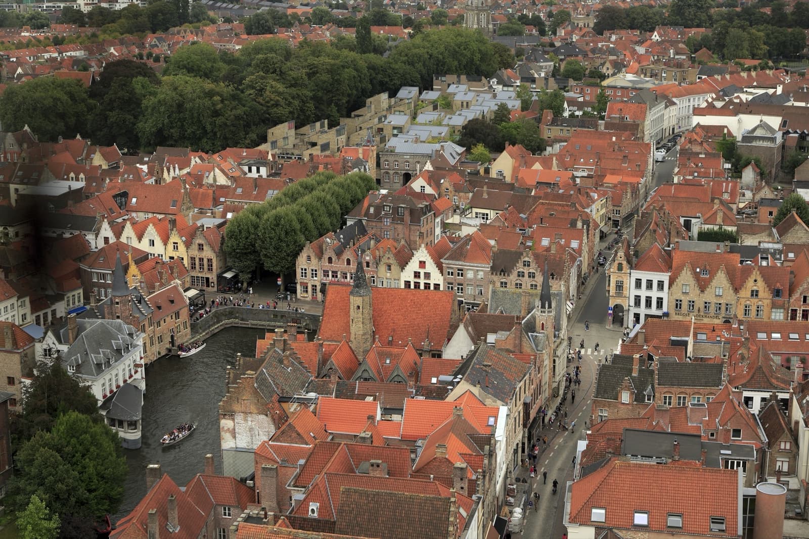 Red roofs and canals of Bruges seen from high above