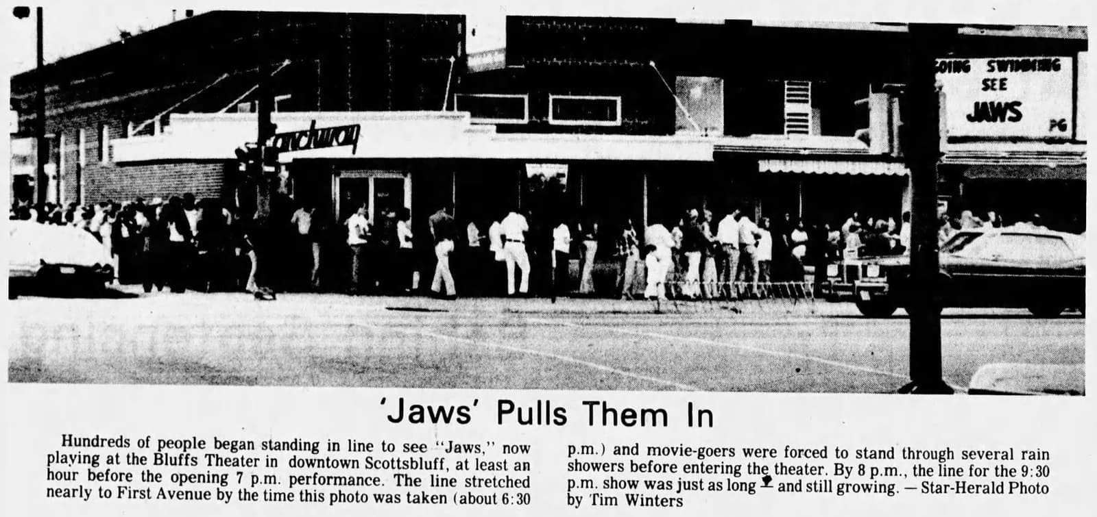 A 1975 newspaper photograph of a long queue outside a cinema showing Jaws