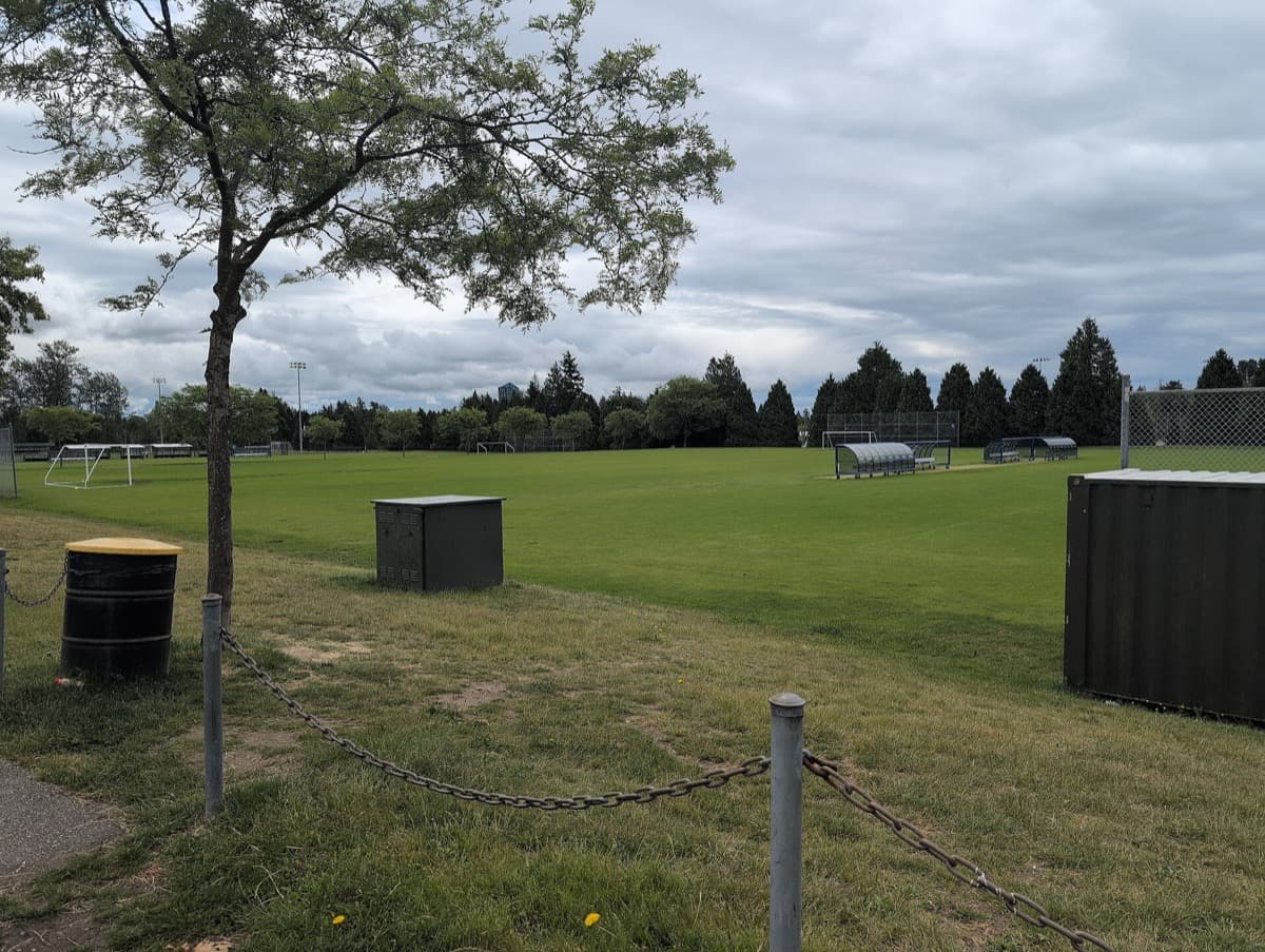 A running track and playing fields at a park