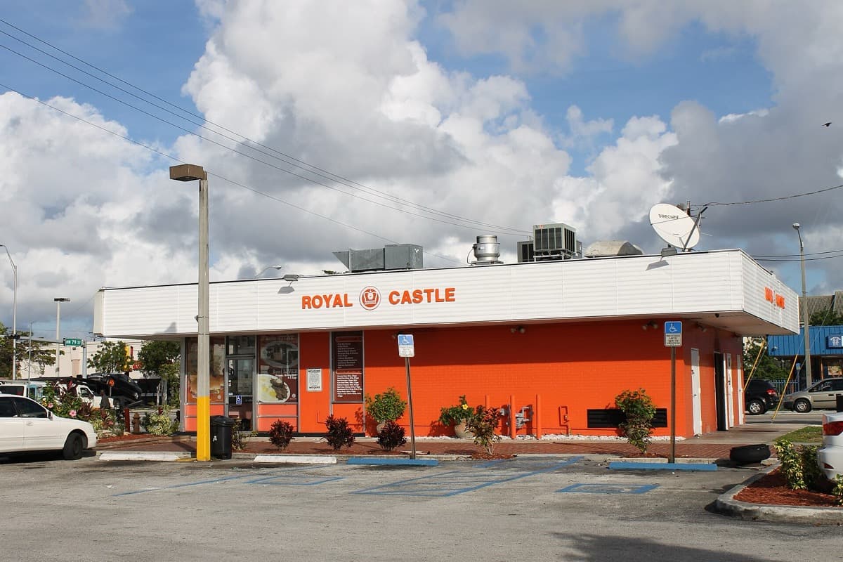 A small orange roadside burger restaurant