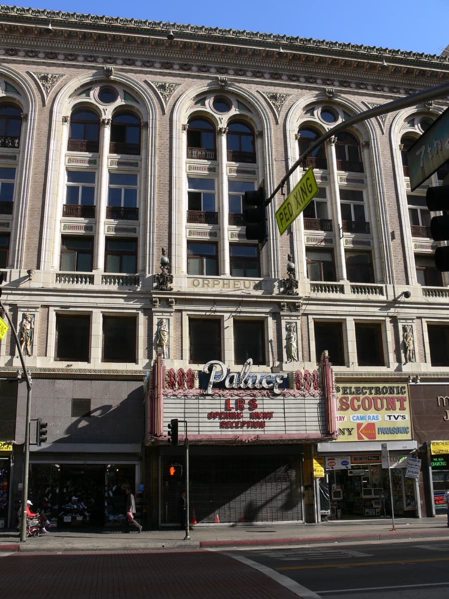 The ornate terracotta front of a theatre on a downtown Los Angeles street