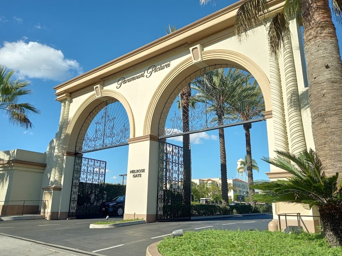 A studio gateway arch with a guard booth on Melrose Avenue