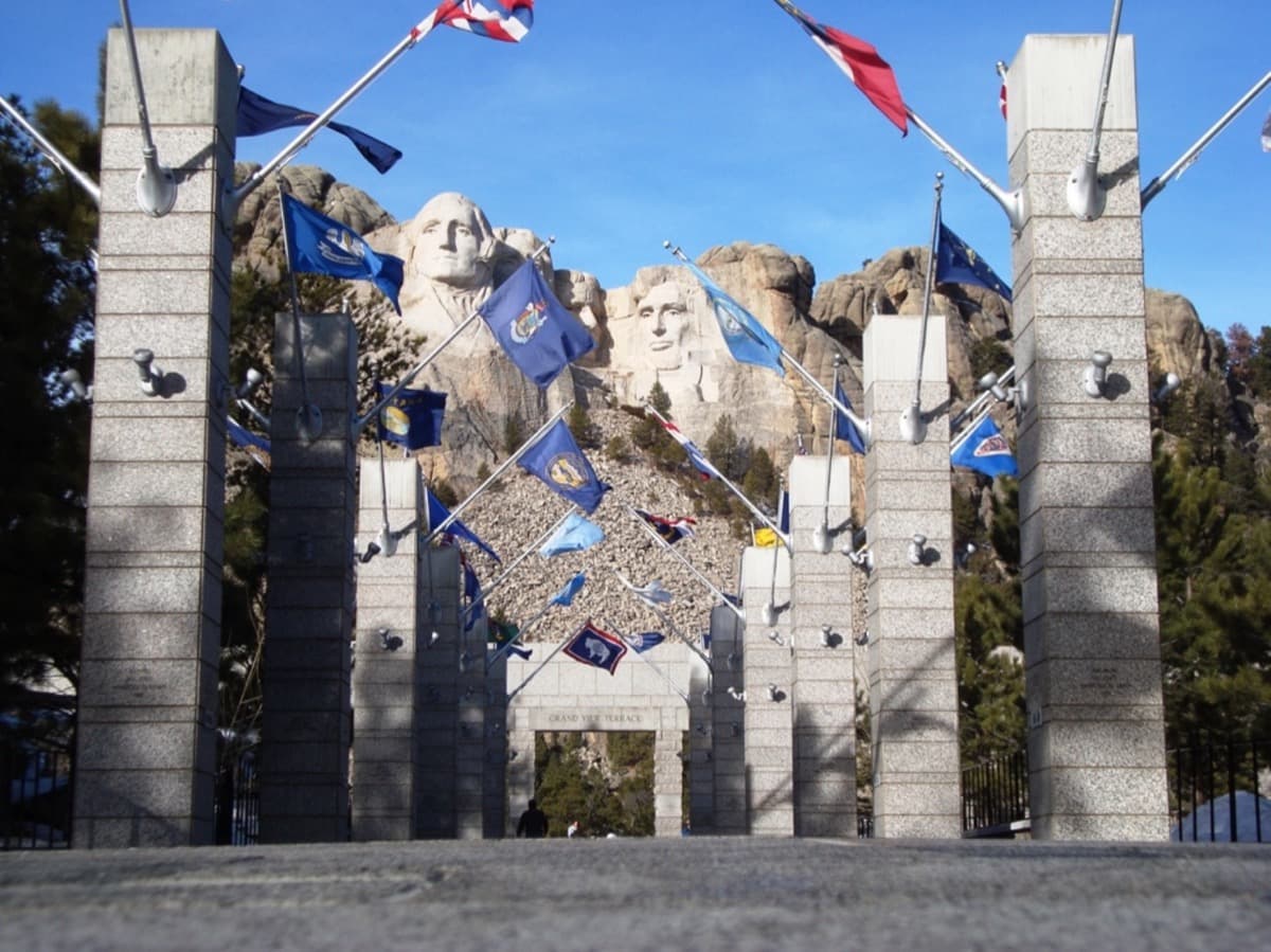 Four presidents’ faces carved in a granite mountainside
