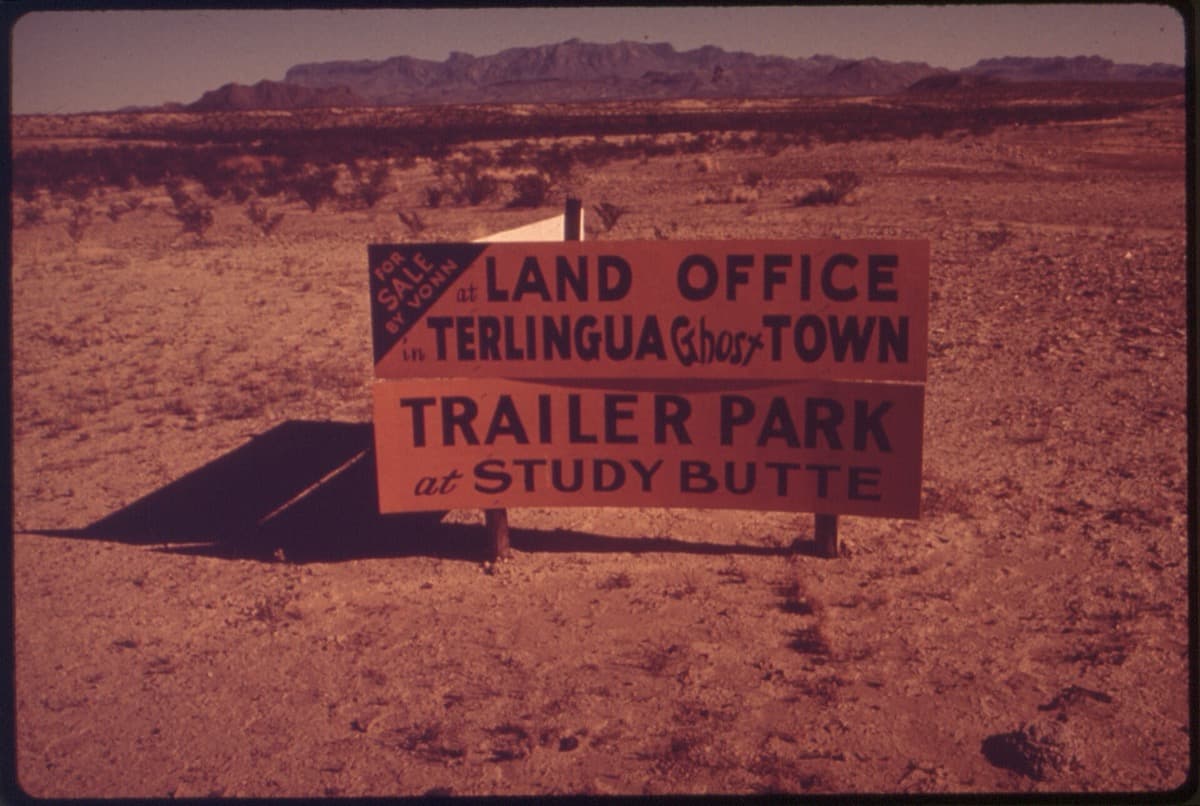 Dry desert country under a wide sky