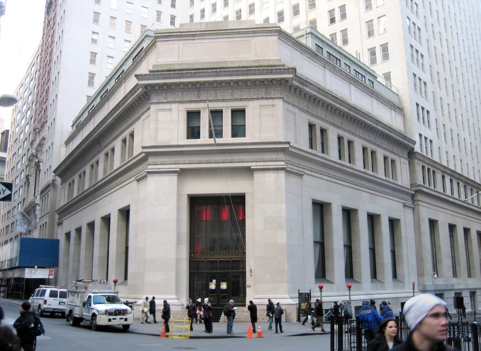 A low marble bank building on a corner in the Financial District