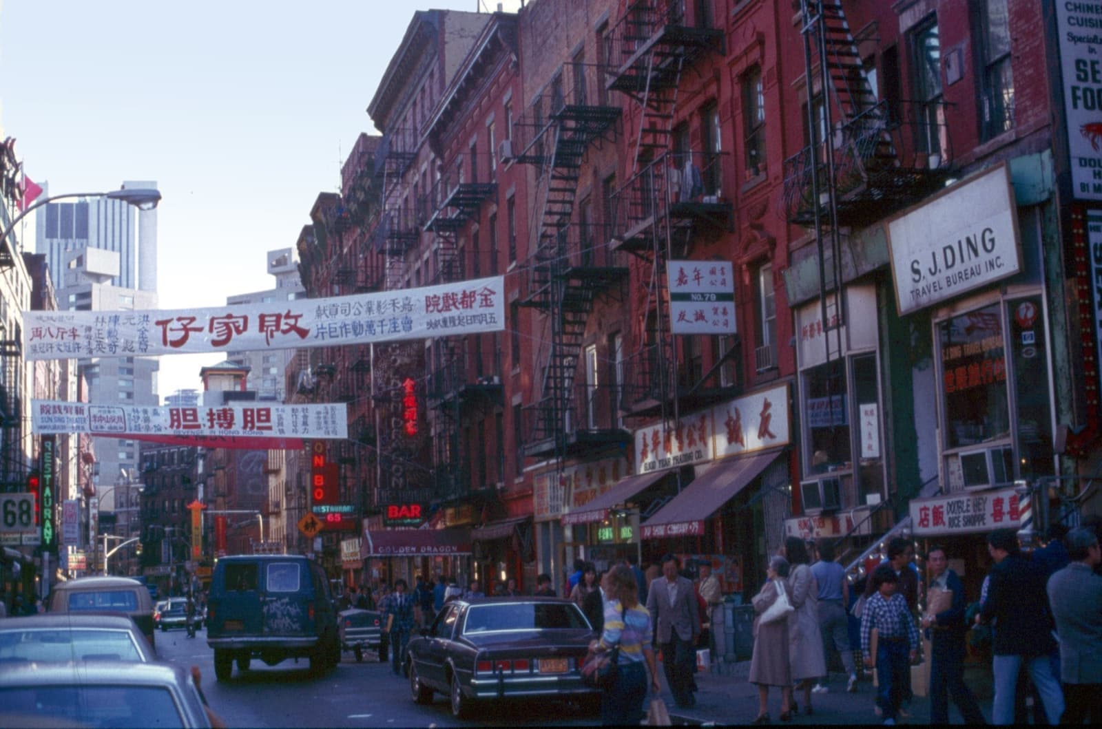 Shop fronts with signs on Mott Street