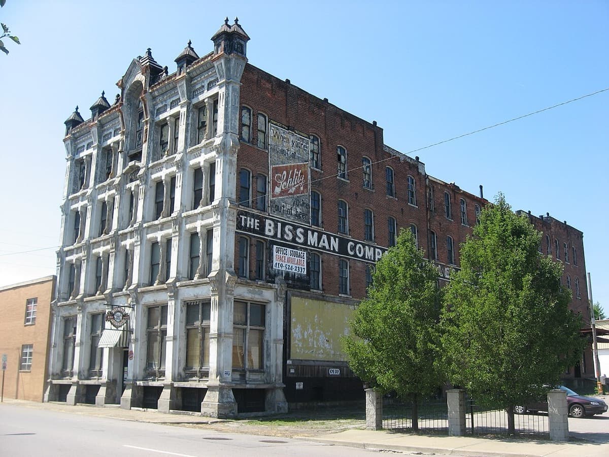 The brick front and side of the Bissman Block on a Mansfield street corner.