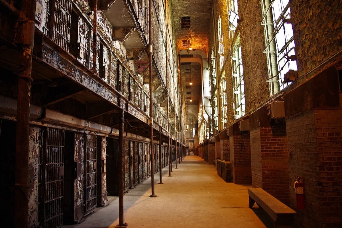 The castle-like stone front of the Ohio State Reformatory under a blue sky.
