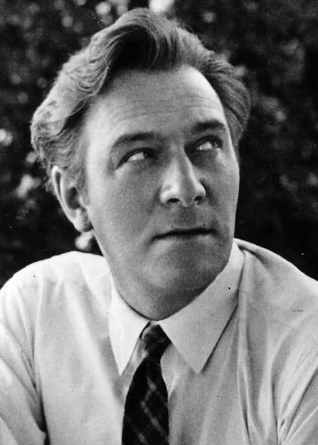 Christopher Plummer in shirt and tie, looking up and away
