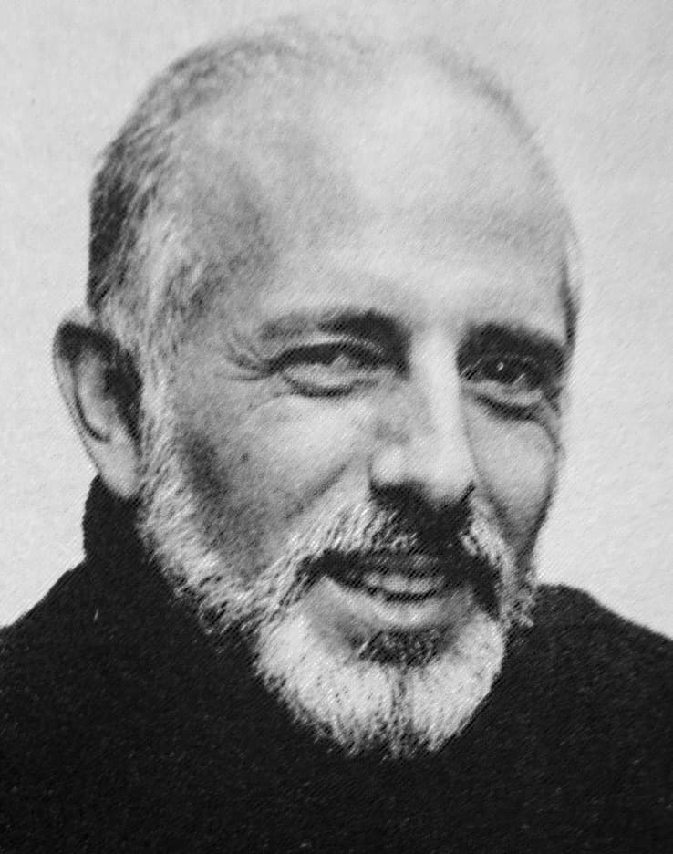 Jerome Robbins with a grey beard, smiling