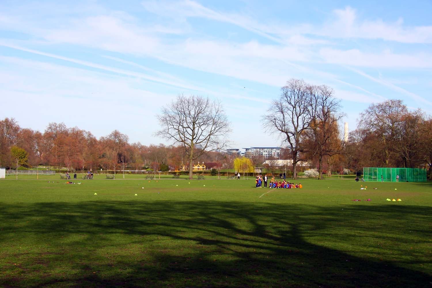 Open grass playing fields in Battersea Park