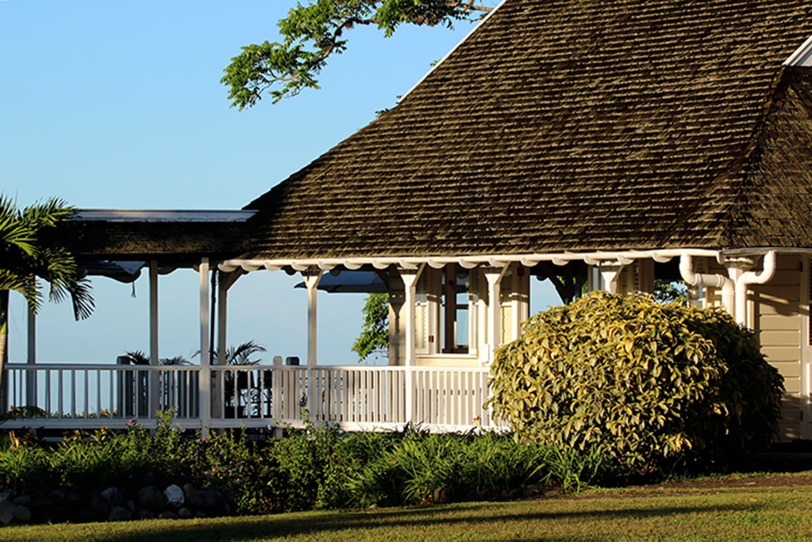 White cottages on a green mountainside at Strawberry Hill