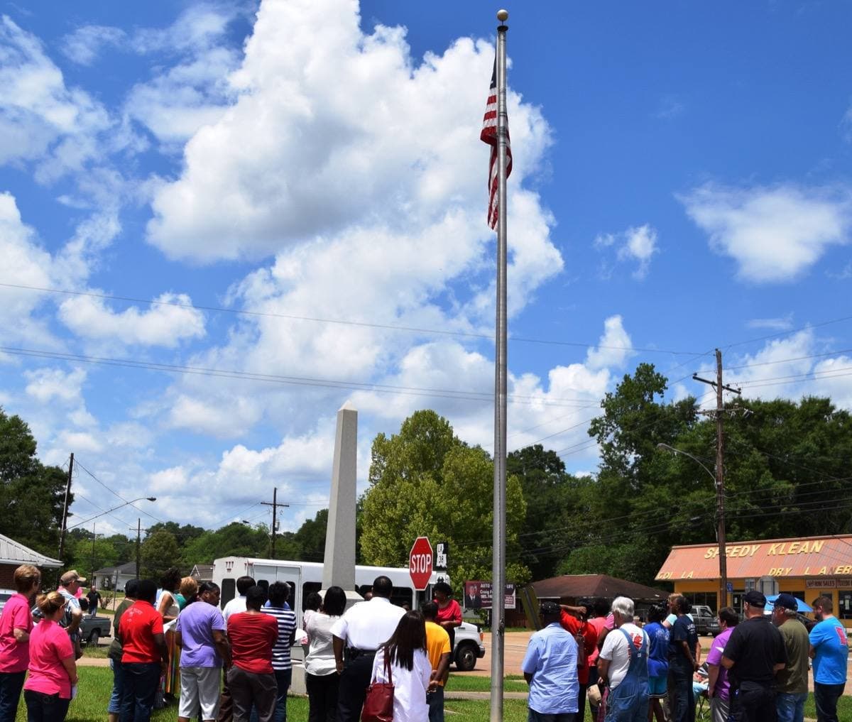A small-town hall beside a road in rural Louisiana