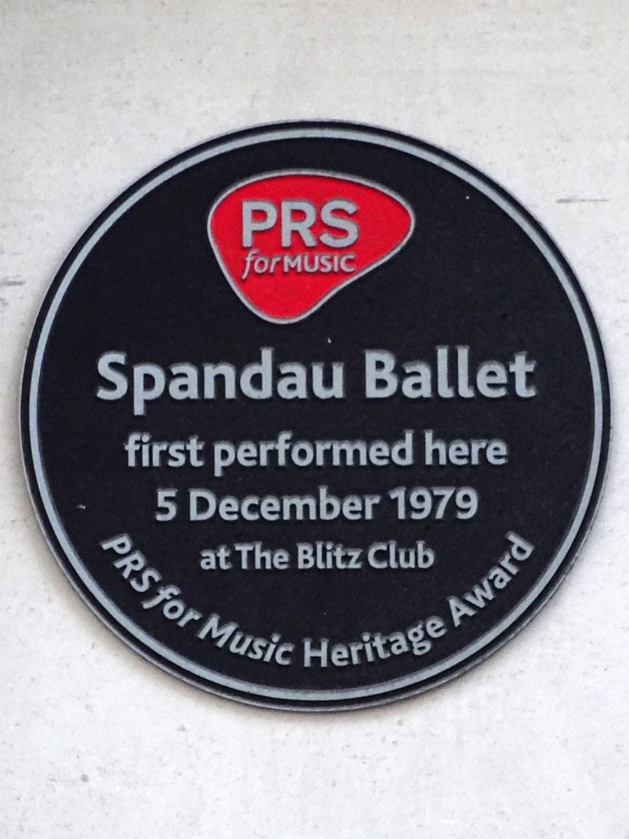 A black round plaque reading that Spandau Ballet first performed here at the Blitz Club