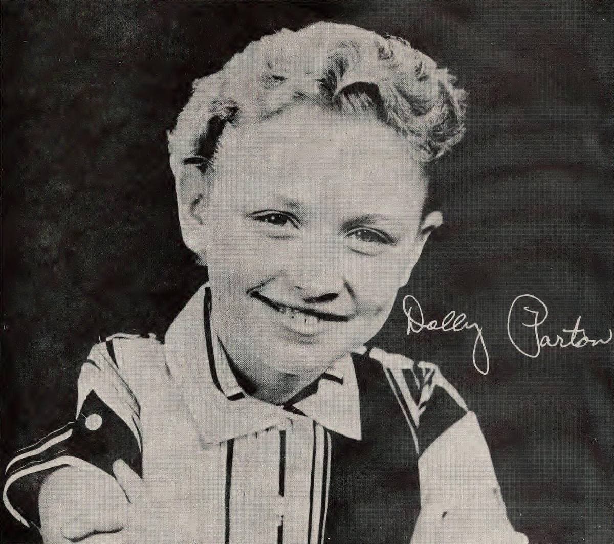A twelve-year-old Dolly Parton smiling in a publicity photograph