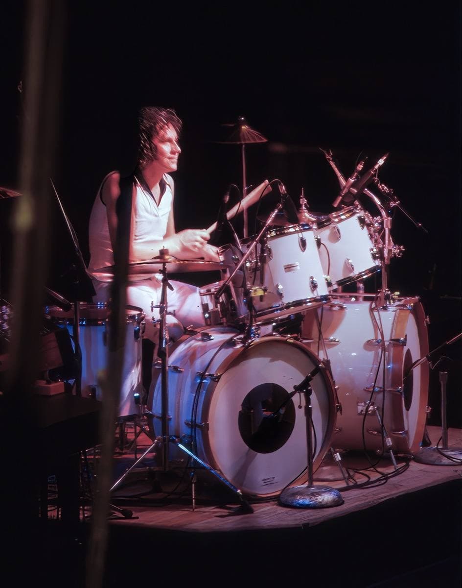 Dennis Elliott at his drum kit on stage in 1979