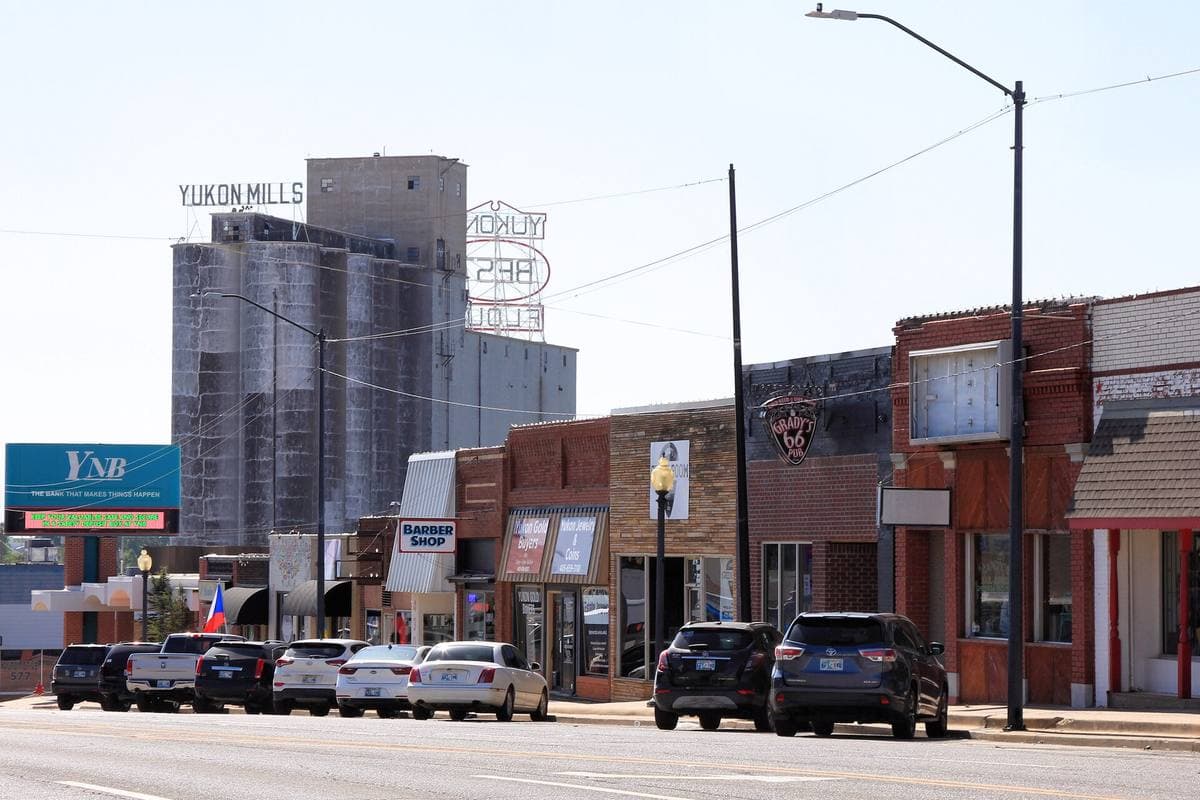 A low brick main street in Yukon, Oklahoma, on a summer day