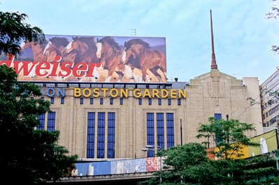 The front of the Boston Garden, with its name in yellow letters under a large billboard