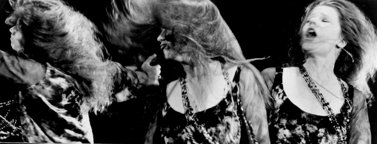 Three frames of Janis Joplin singing, hair whipping across her face, beads swinging