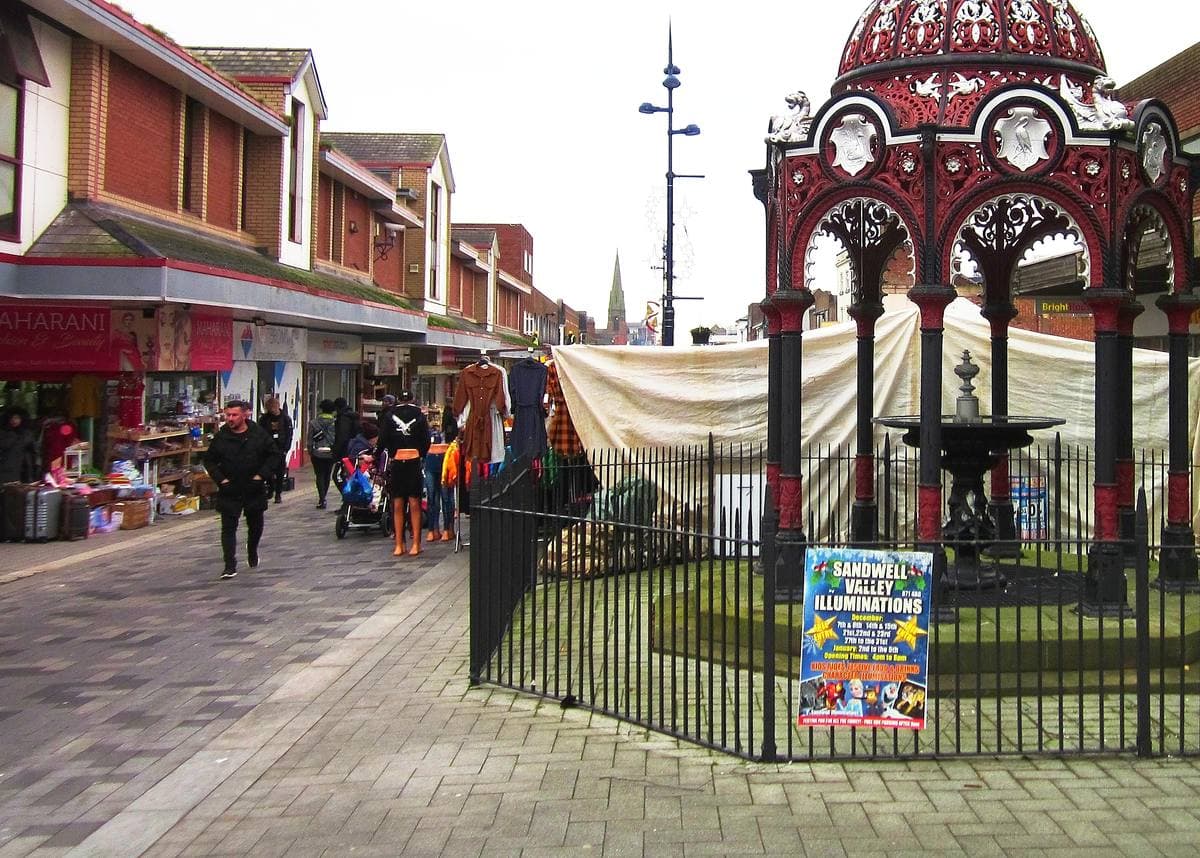 West Bromwich High Street with shops and pedestrians