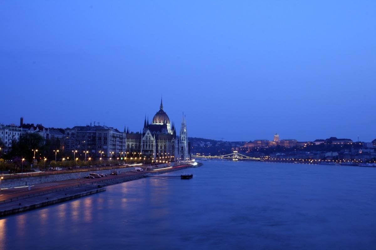 The Hungarian Parliament lit up at night across the Danube