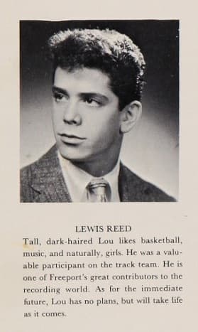 A black and white school portrait of a teenage boy with a dark quiff, jacket and tie