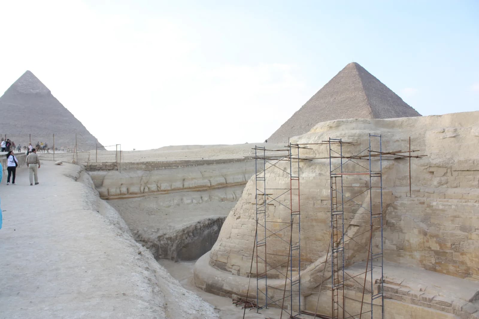 The Great Sphinx seen from behind, with the pyramids beyond, in 2010
