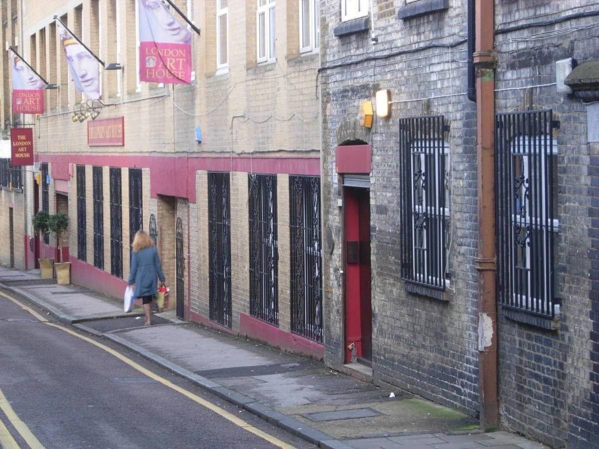 A quiet London side street of brick buildings