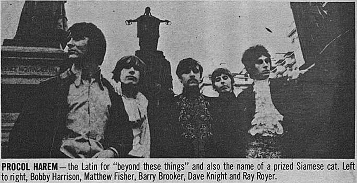 Five young men in 1967 clothes posed together in a black-and-white magazine photograph