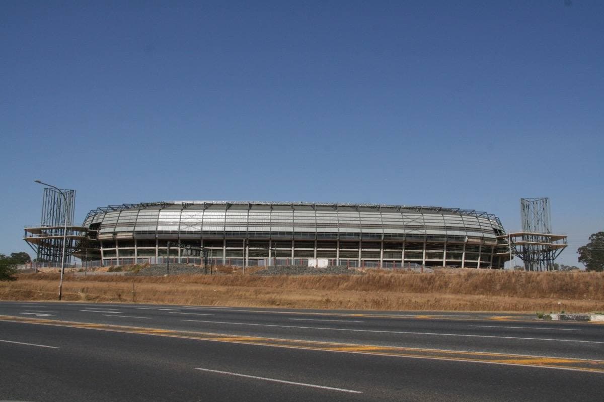 A modern steel stadium seen from outside in Soweto