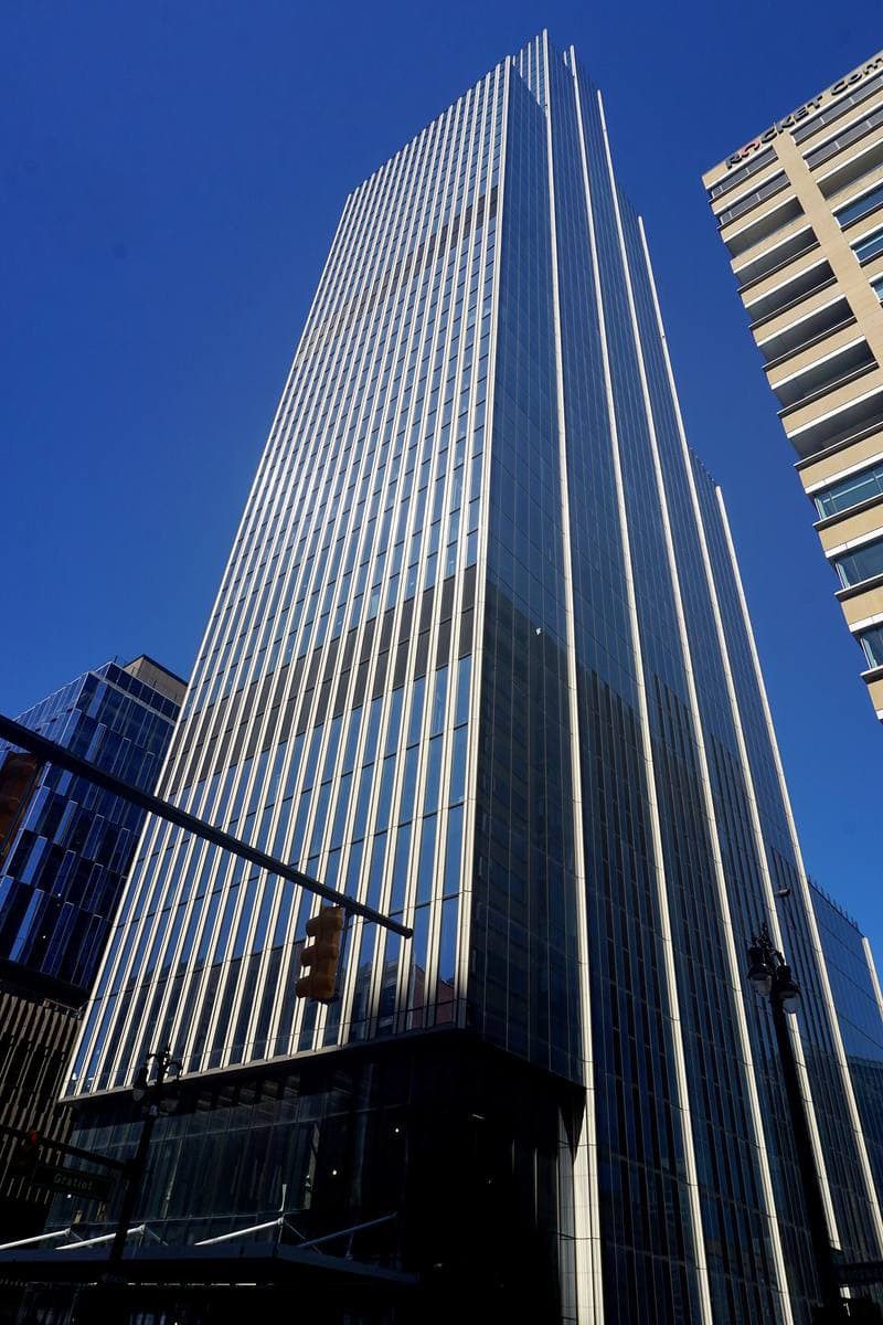 A new glass tower rising above Woodward Avenue